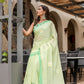 Light green designer malmal saree with flowers featuring elegant embroidery and soft draping