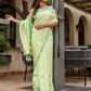 Elegant Stylera designer malmal saree with flowers in green, perfect for festive occasions