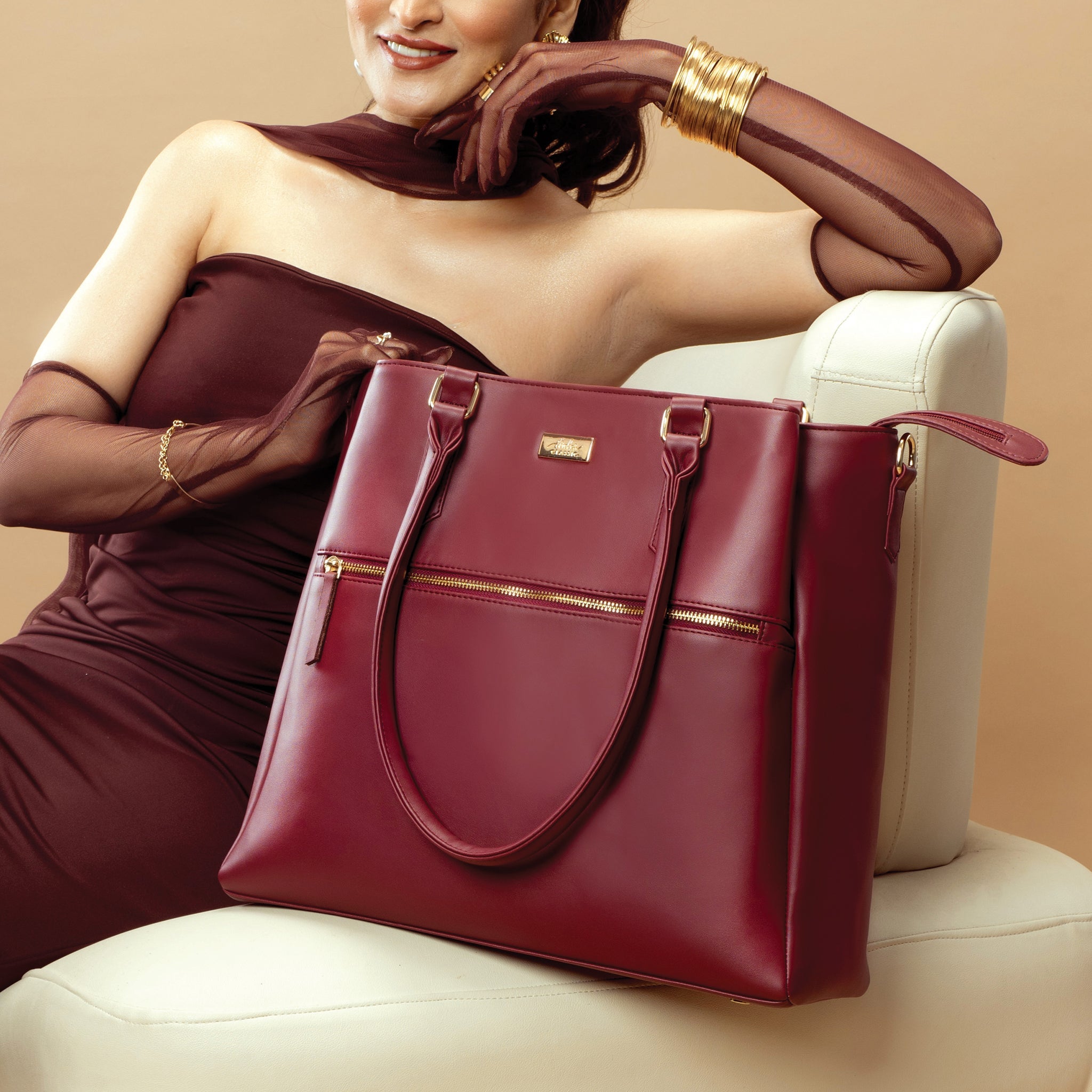 Aspire tote bag in maroon by Stylera, a stylish designer maroon handbag for elegant outings