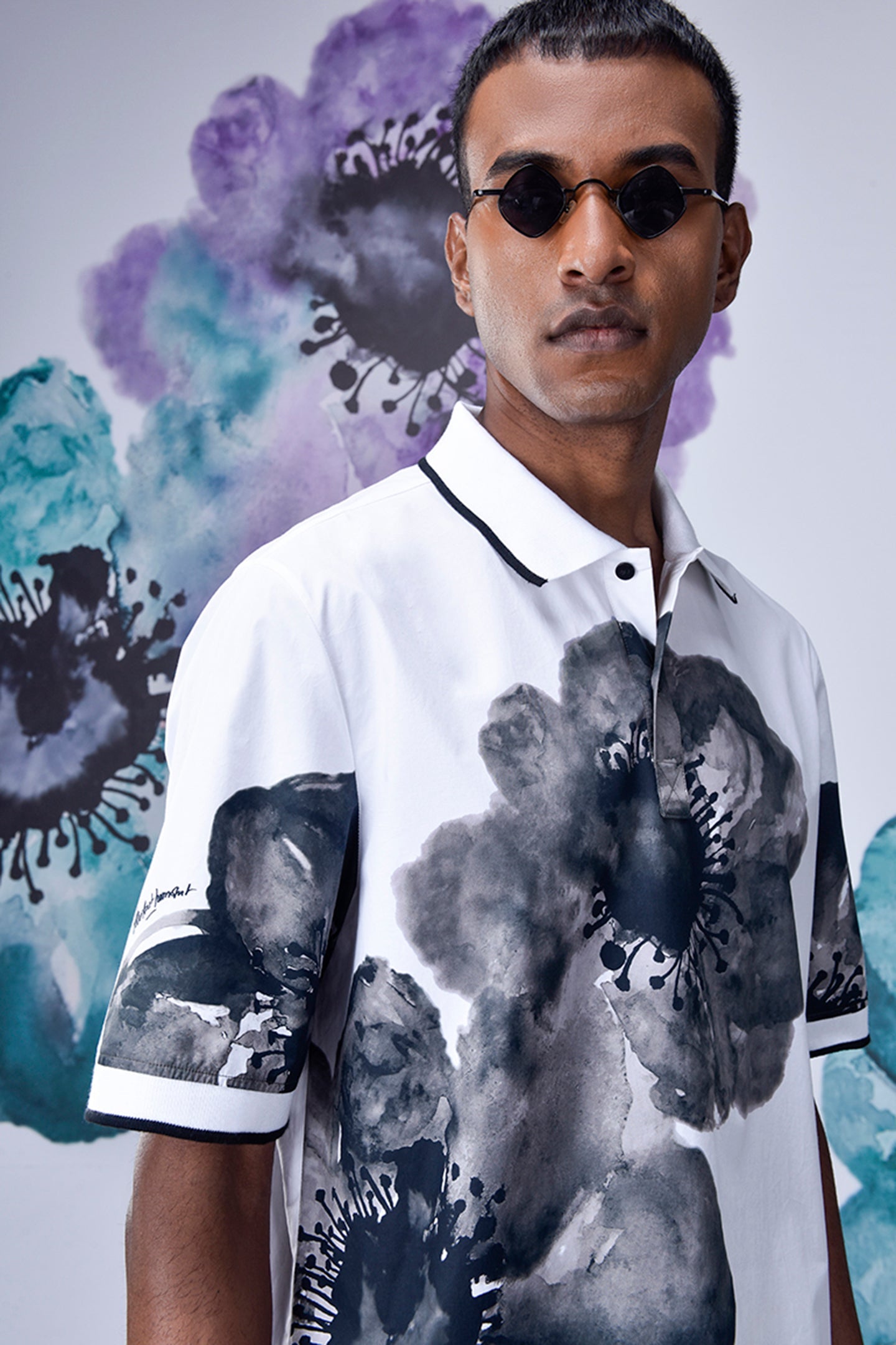 Mens floral polo shirt by Stylera in white with large black and gray flower prints