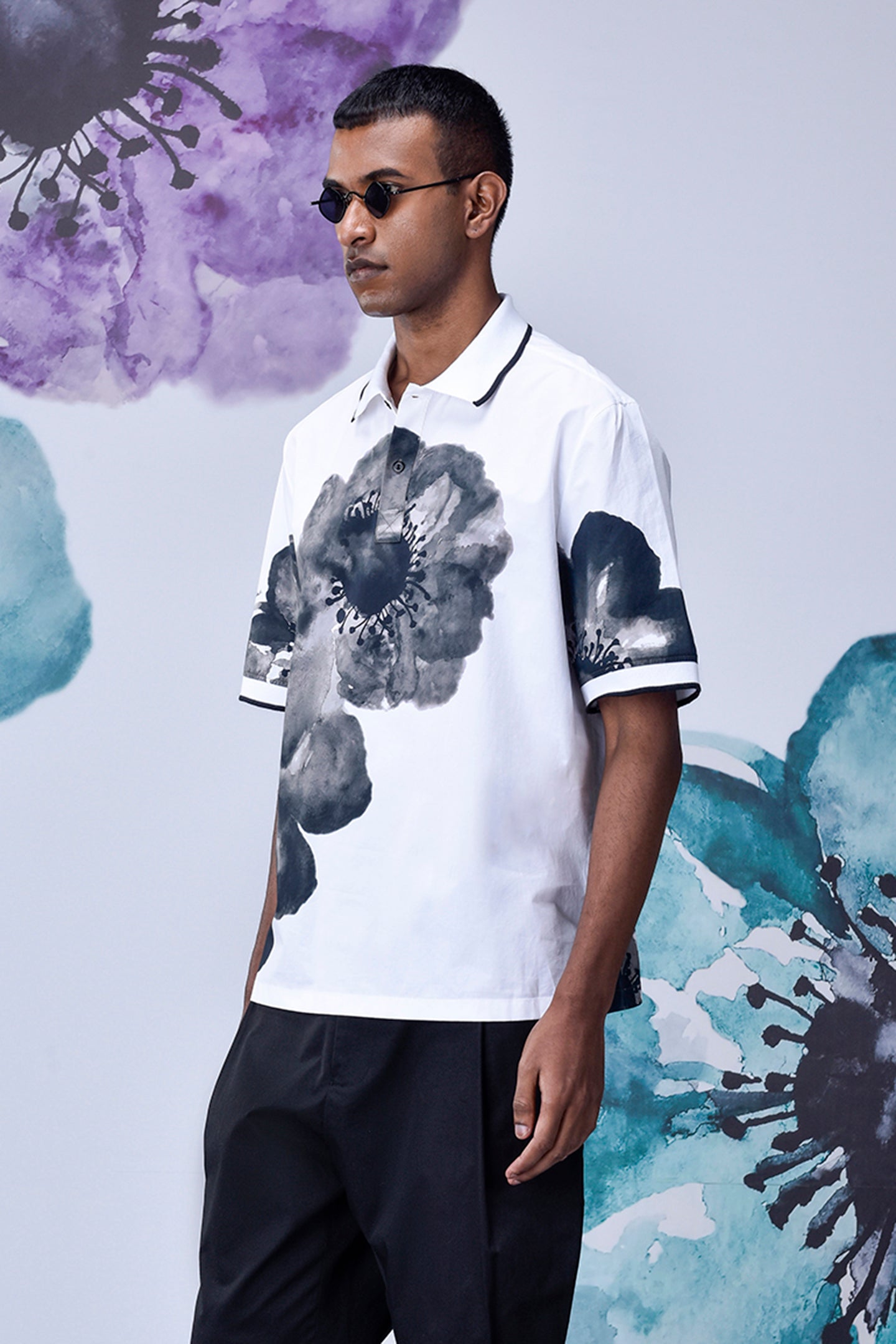 Mens floral polo shirt by Stylera with black and white large floral prints