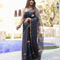 Elegant black designer party wear saree for women with floral motifs and sheer fabric, perfect for special occasions