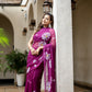 Elegant designer party wear saree for women in purple with floral embroidery and sheer pallu