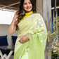 Elegant designer party wear saree in green with floral embroidery, perfect for festive occasions