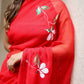 Elegant designer red saree for weddings with floral embroidery and sequins for a sophisticated look