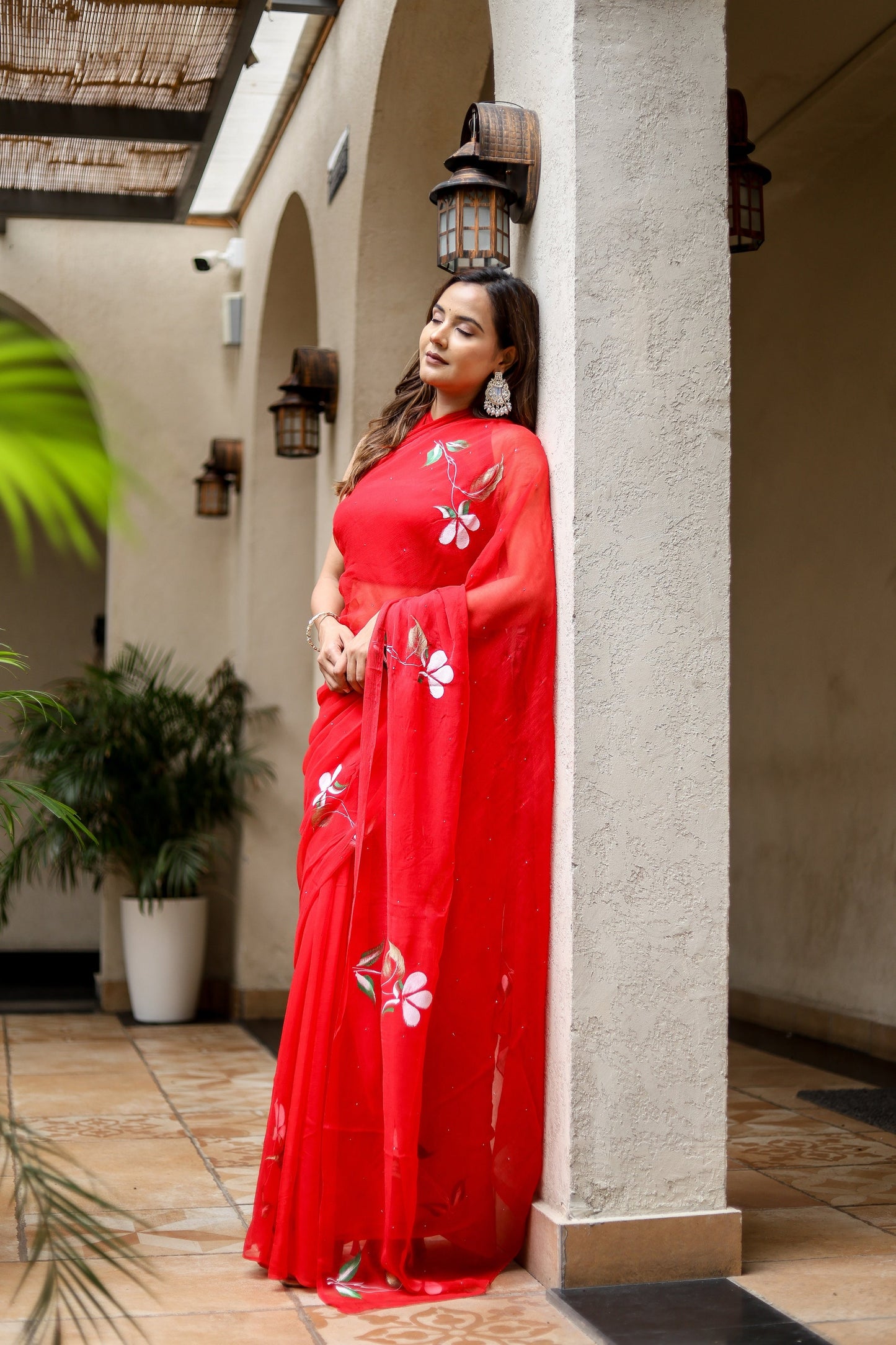 Elegant Stylera designer red saree for weddings with floral embroidery, perfect for festive occasions