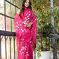 Elegant pink designer saree for special occasions with floral patterns, perfect for festive events