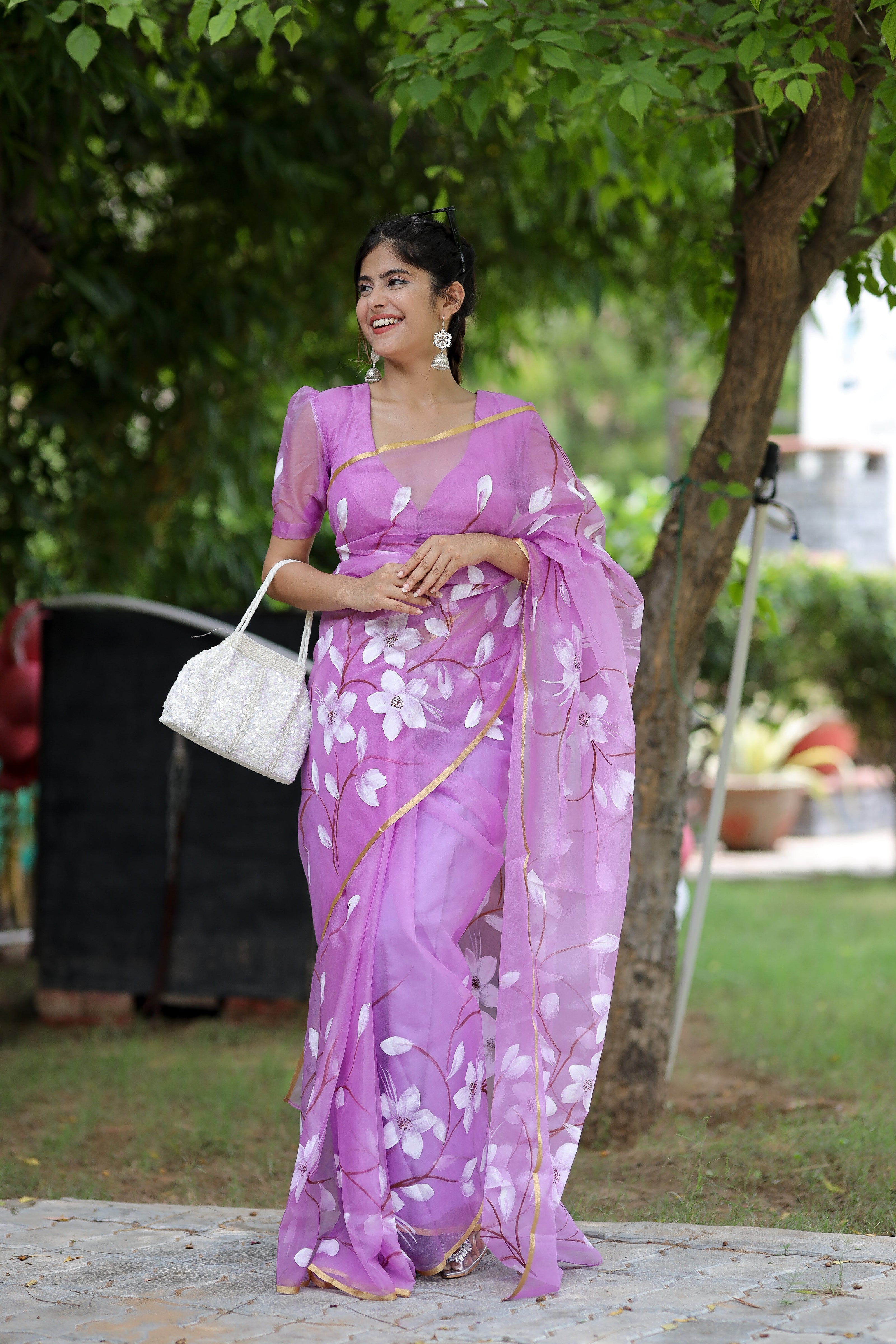 Elegant DiraByDimple designer saree for special occasions in light purple with floral patterns