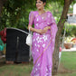 Elegant pink designer saree for special occasions with floral patterns, perfect for festive celebrations