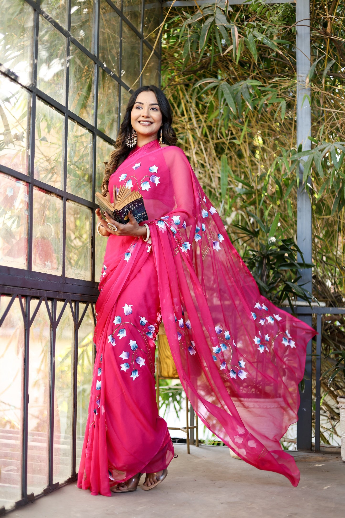 Elegant pink designer saree for special occasions with floral embroidery and flowing dupatta