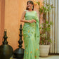 Elegant green designer saree for women with unique floral embroidery, perfect for special occasions