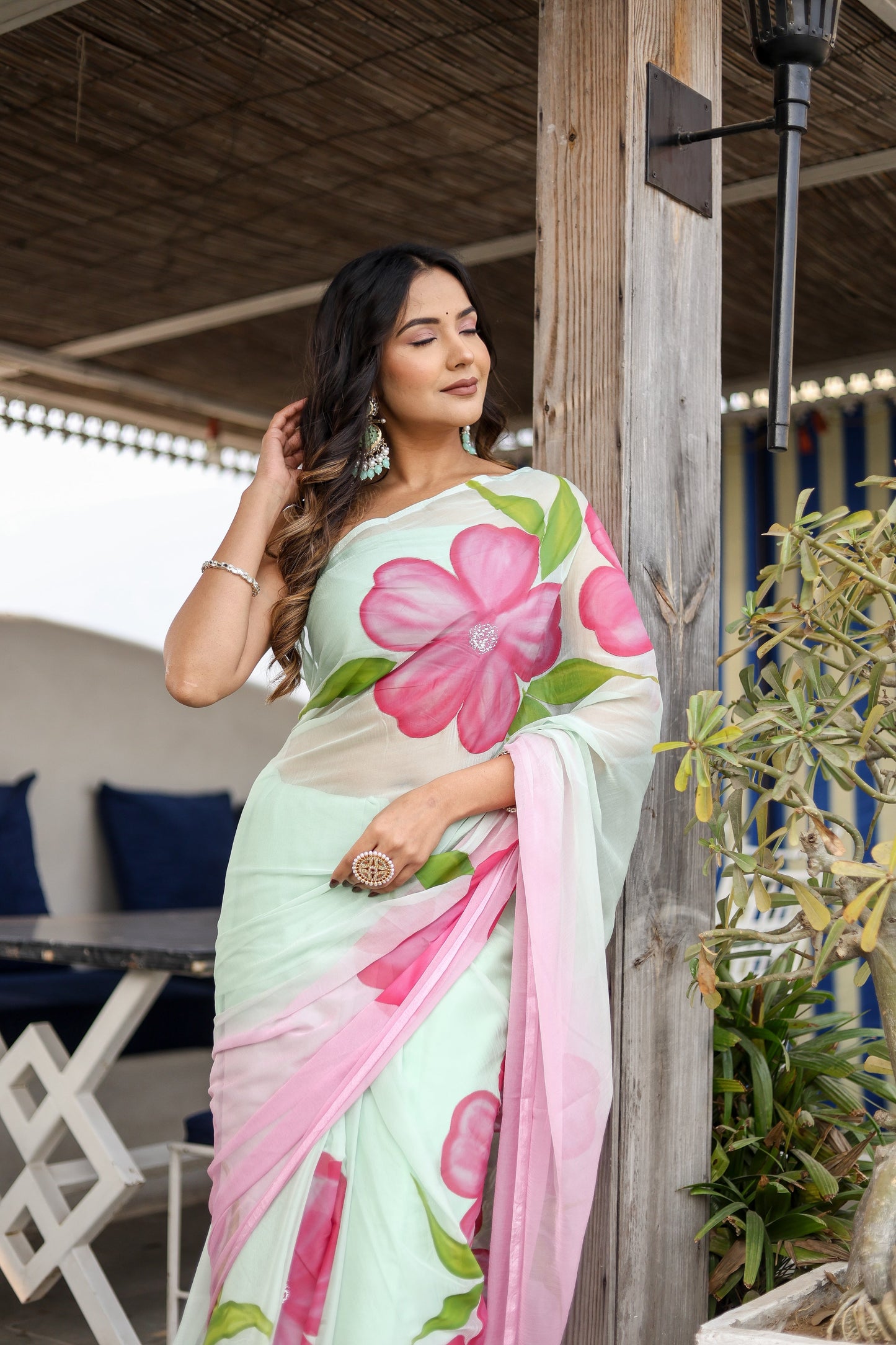 Elegant designer saree for women with floral print in soft pastel colors, perfect for special occasions