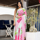 Elegant designer saree for women featuring vibrant floral prints in pink and mint green colors