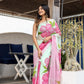 Elegant Stylera designer saree for women featuring vibrant pink floral patterns on a light fabric