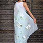 Elegant light blue designer saree with floral embroidery, showcasing light and airy fabric draped beautifully.