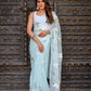 Elegant light blue designer saree with floral embroidery, perfect for special occasions and festive events