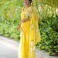 Elegant yellow designer saree with floral art, perfect for festive occasions and special events