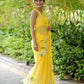 Bright yellow designer saree with floral art, ideal for festive occasions and celebrations