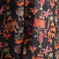 Designer silk bandi for men with vibrant elephant and floral patterns on a dark background