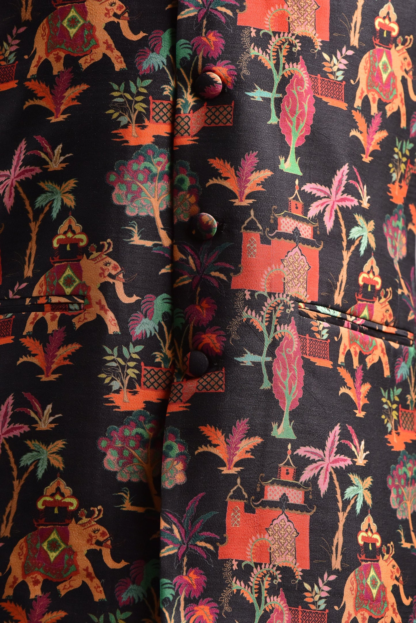 Designer silk bandi for men with vibrant elephant and floral patterns on a dark background