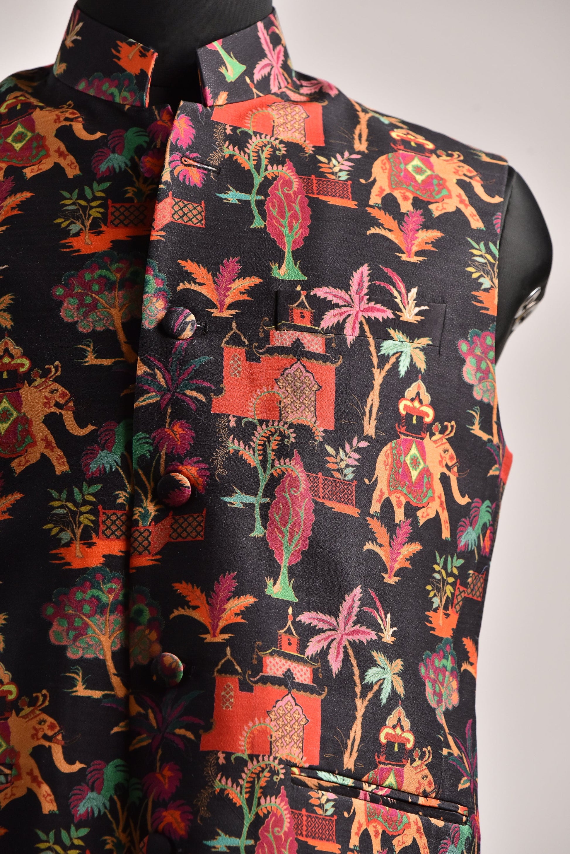 Designer silk bandi for men featuring vibrant patterns with elephants and tropical scenery