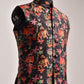 Designer silk bandi for men featuring vibrant multi-color floral patterns on a stylish black background