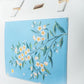 Stylera large designer tote bag featuring a floral print on a blue background