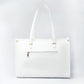Large designer tote bag in white with gold accents and a zippered pocket for added convenience
