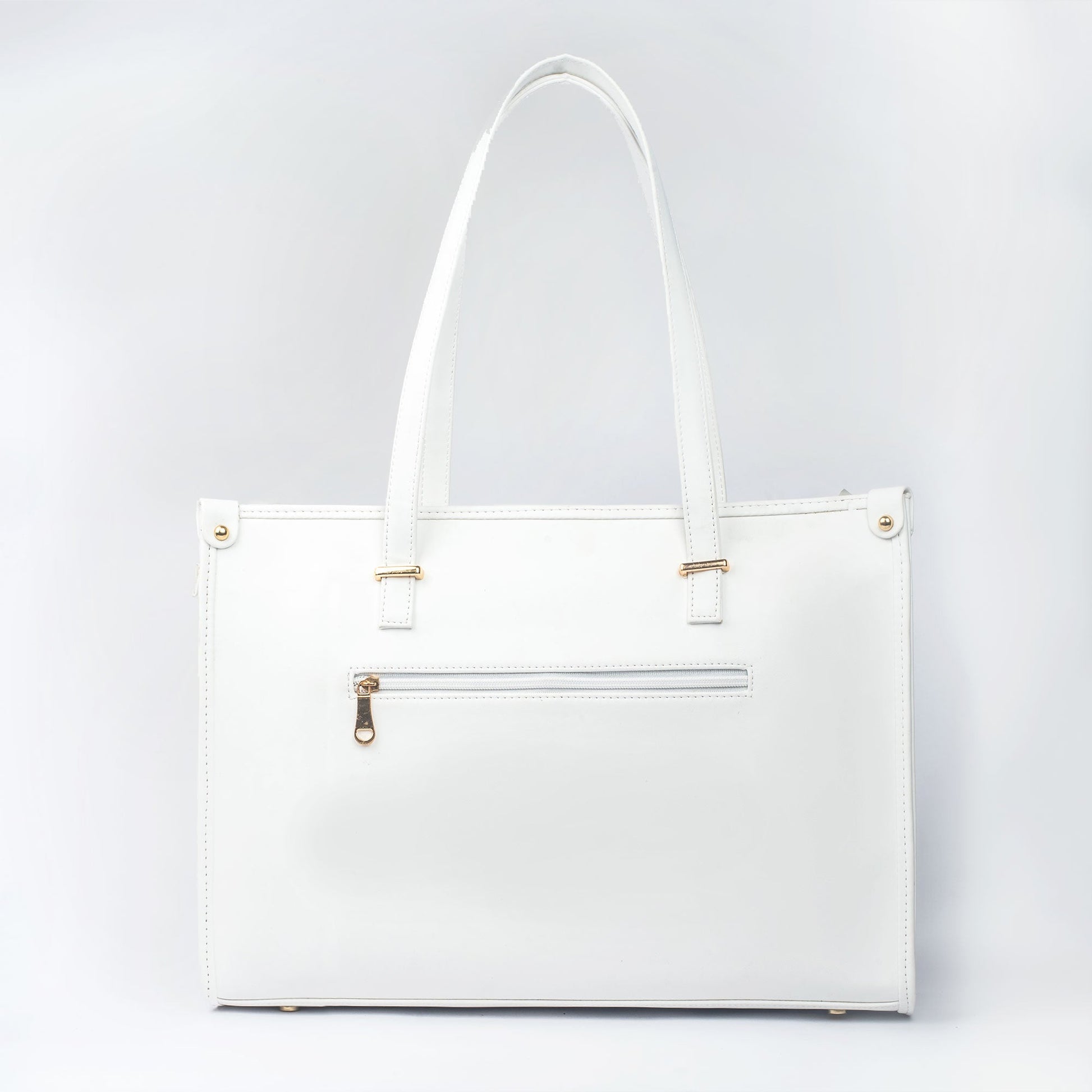 Large designer tote bag in white with gold accents and a zippered pocket for added convenience