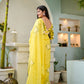 Stunning designer yellow saree hand painted, showcasing intricate floral details for elegant occasions
