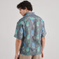 Back view of a Stylera drop shoulder shirt for men featuring a vibrant floral pattern