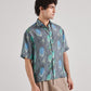 Stylera drop shoulder shirt for men with tropical print design in gray and green hues