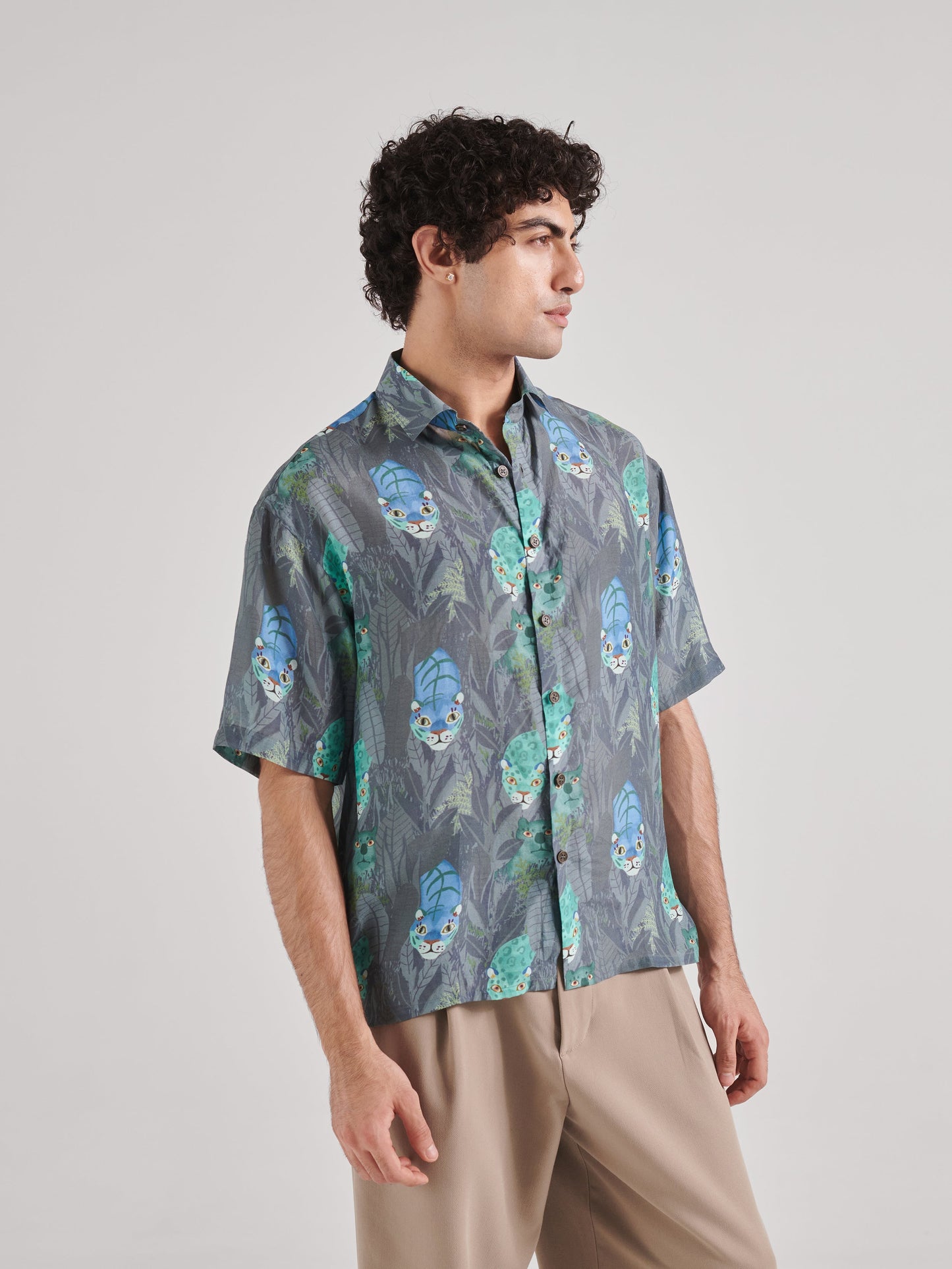 Stylera drop shoulder shirt for men with tropical print design in gray and green hues