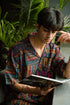 Earthy print oversized shirt for men, featuring vibrant patterns and a relaxed fit, ideal for casual wear