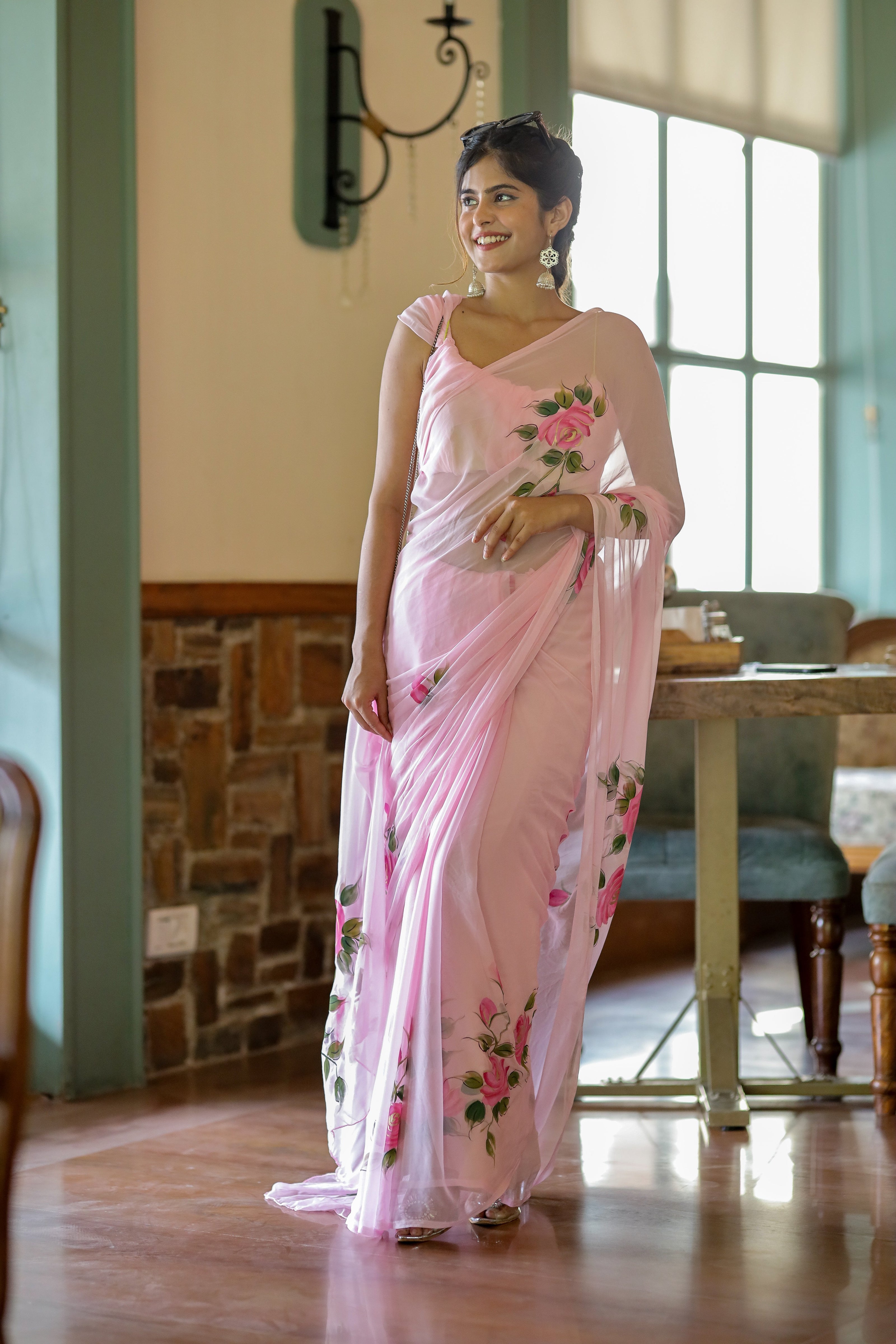 Elegant party wear chiffon saree with floral embroidery in soft pink, perfect for special occasions.