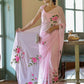 Elegant party wear chiffon saree in soft pink with floral embroidery, perfect for festive occasions