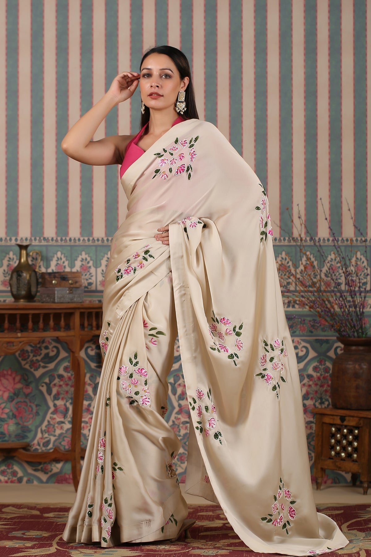 Elegant party wear saree in beige with floral embroidery, perfect for festive occasions