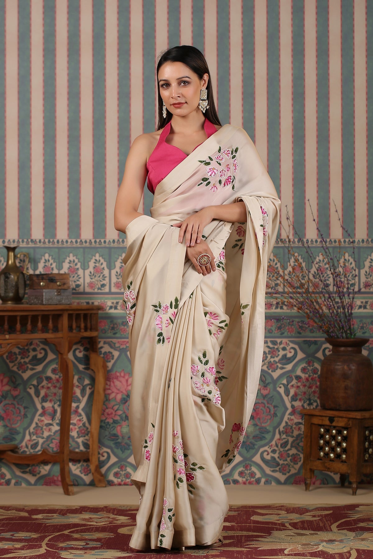 Stylera's Elegant party wear saree in cream with floral embroidery, perfect for festive occasions