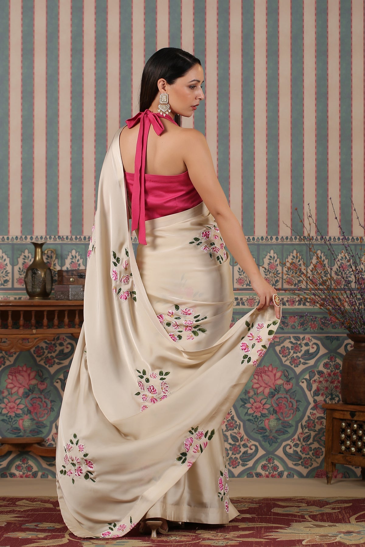 Elegant party wear saree with floral designs, perfect for special occasions and celebrations