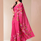 Elegant pink saree for parties featuring beautiful floral embroidery and stylish draping