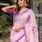 Elegant pink exclusive designer saree for parties with purple floral patterns and stylish accessories