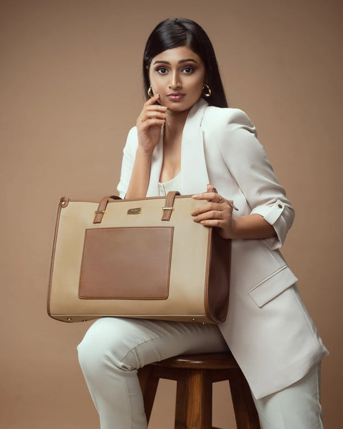 Stylish model holding a fashionable brown tote purse by Stylera for a chic look
