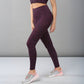 Stylera fashionable leggings for women in purple leopard print, paired with athletic shoes