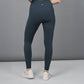 Woman wearing fashionable workout leggings teal with high waist and a sleek design for active lifestyles