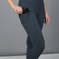 Fashionable workout leggings teal with a stylish cut-out design and side pocket for convenience