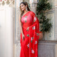 Elegant floral designer chiffon saree in red with floral embroidery, styled for a traditional look