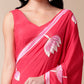 Elegant pink floral designer mal mal saree with beautiful floral patterns and a graceful drape