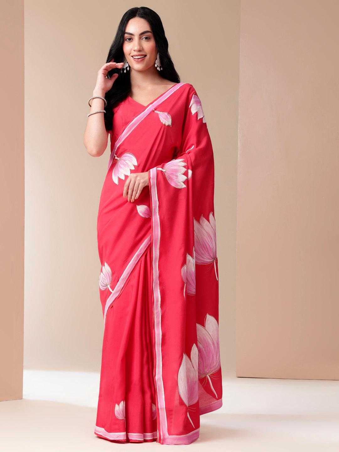 Elegant Stylera floral designer mal mal saree in vibrant pink with lotus prints for festive occasions