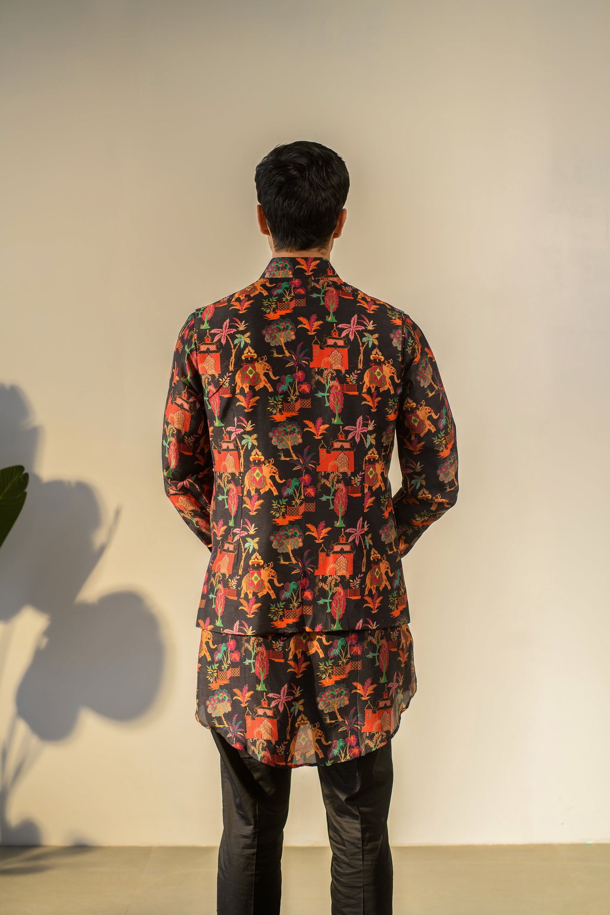 Floral kurta bandi suit by Stylera featuring a colorful print and a stylish design for festive occasions