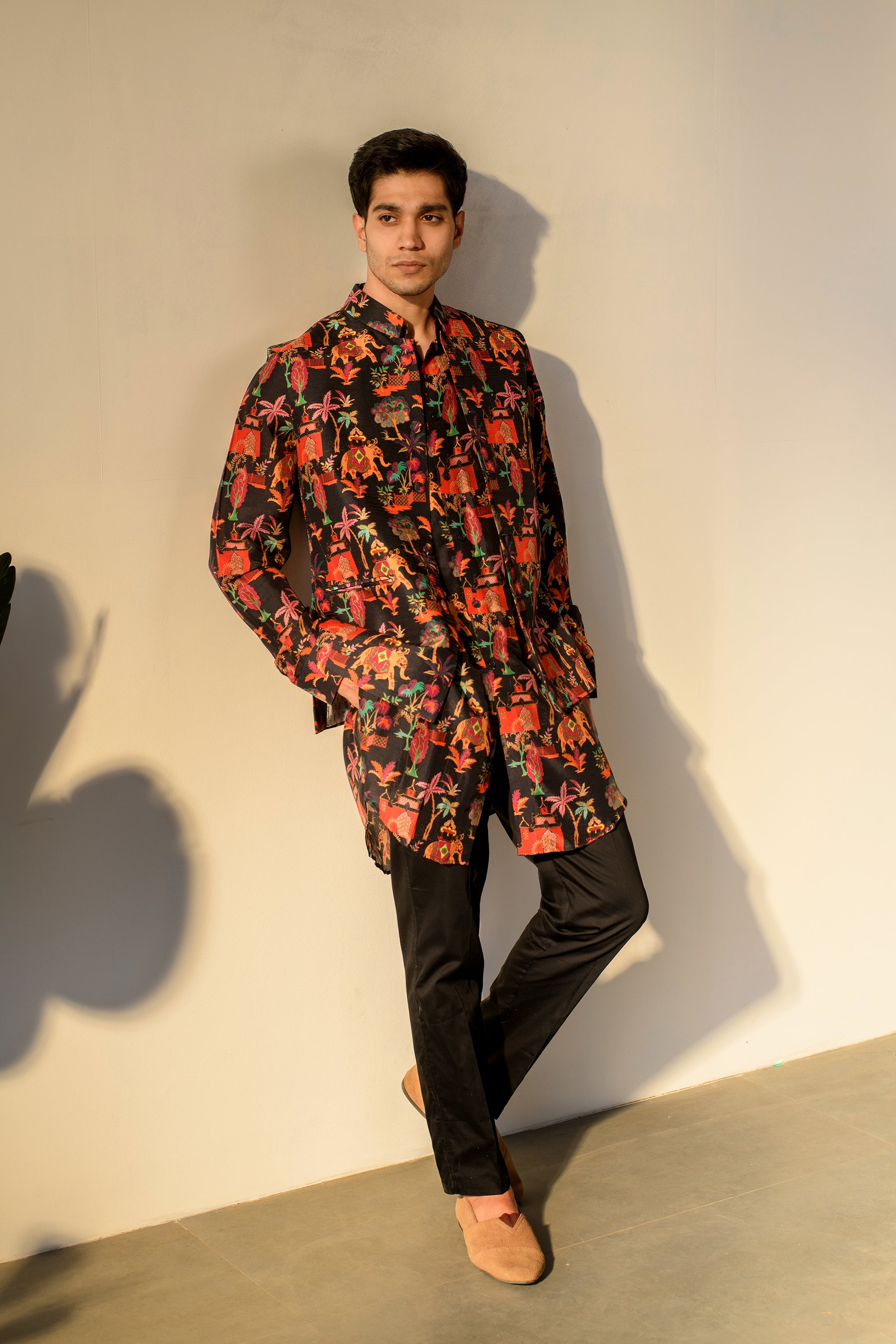 Floral kurta bandi suit by Stylera with vibrant colors, perfect for festive occasions and celebrations.